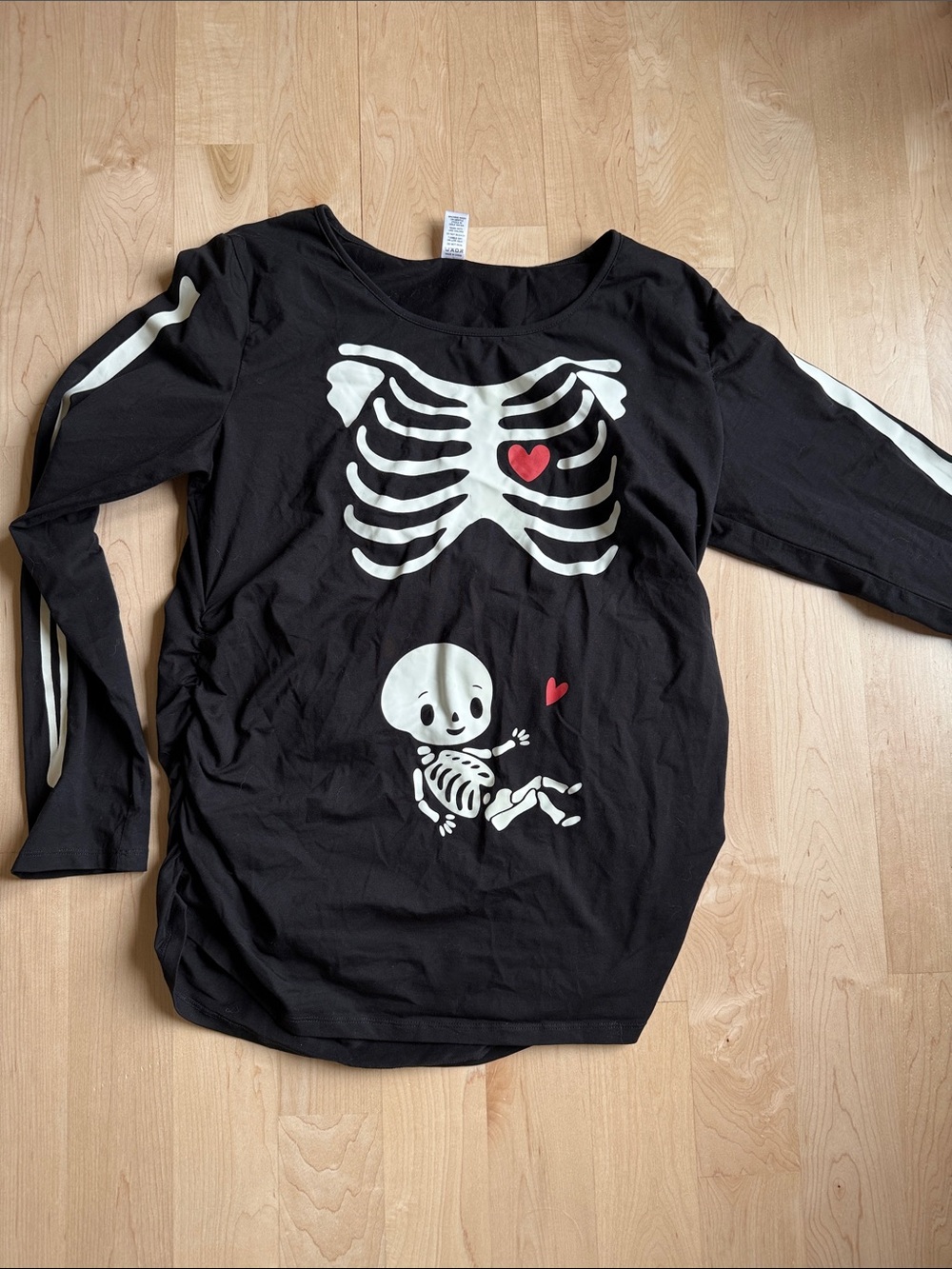 Maternity long sleeve skeleton shirt.